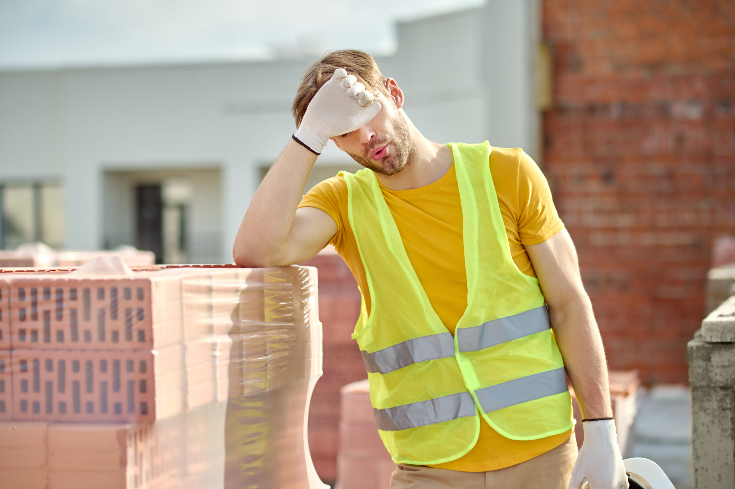 Worker tired on construction site