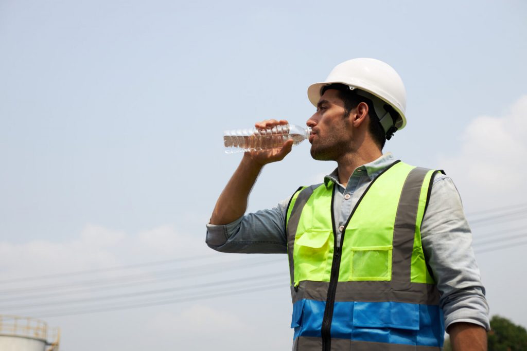 A man drinking water