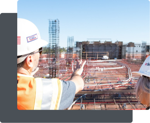 Worker showing construction site