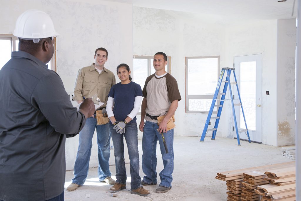 Worker discussing about the home